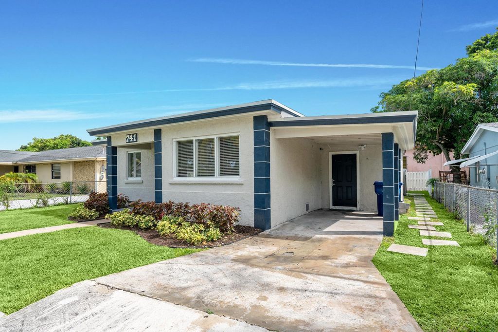 Photo of 741 W 10th Street, Riviera Beach, FL 33404 (MLS # B26027977)