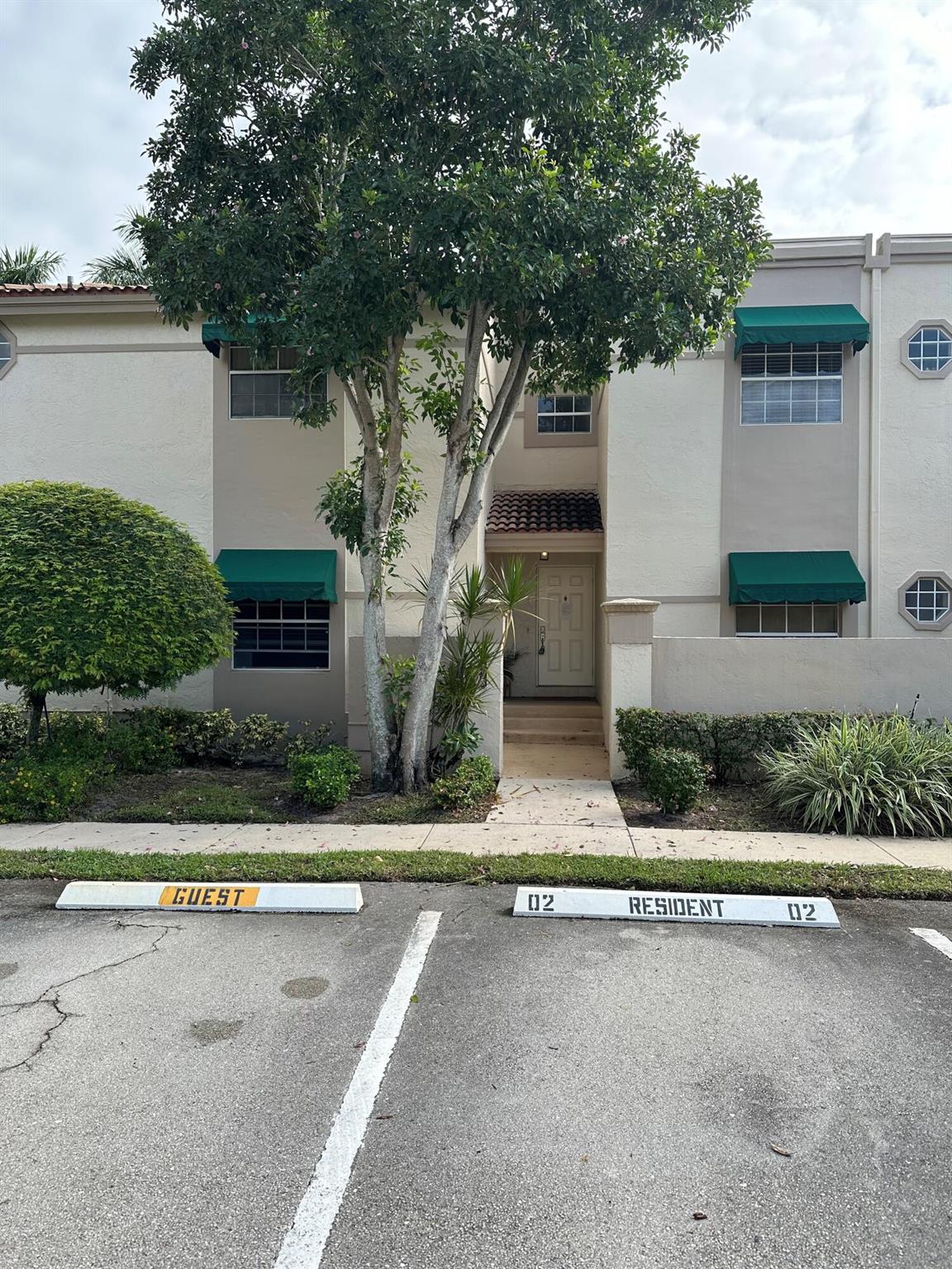 Desirable 2 bed/2bath corner unit, tastefully furnished and available for immediate occupancy. Ground floor entrance with staircase leading to open, light & bright 2nd floor living area with vaulted ceilings. Two large screened terraces with lovely garden views. Updated eat in kitchen with granite counters and stackable W/D. Come and enjoy the Boca Pointe lifestyle! The Plum subdivision has its own community pool just a short distance away.