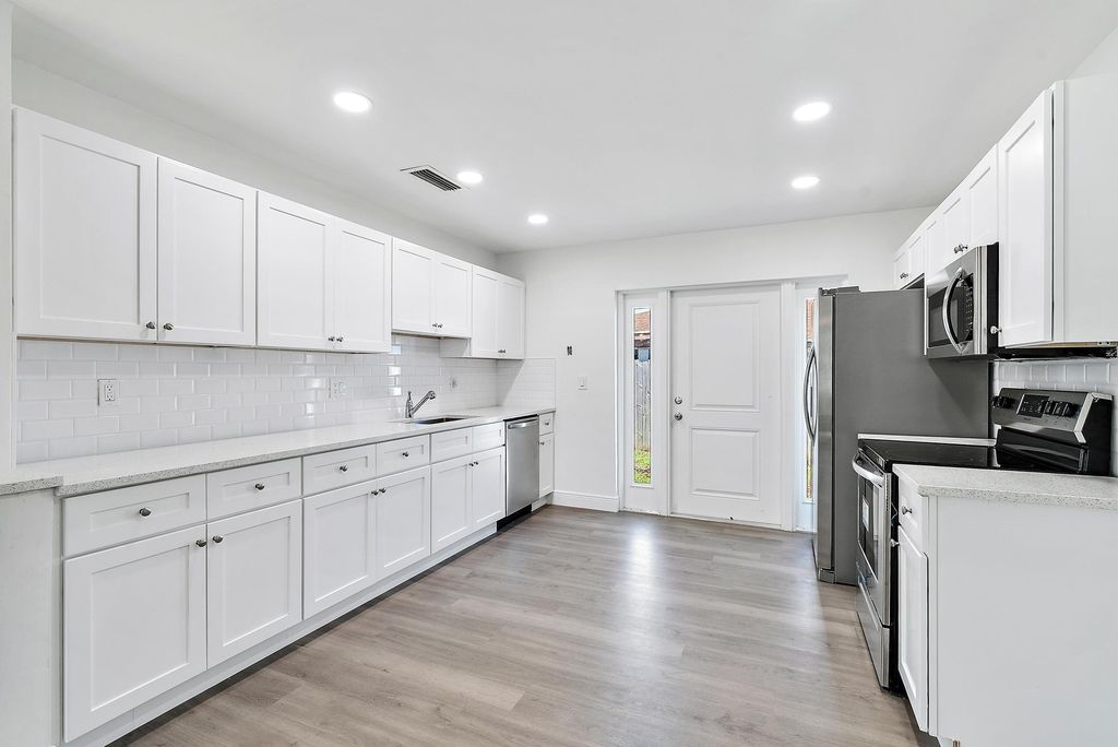 Photo of 9160 W Highland Pines Boulevard, Palm Beach Gardens, FL 33418 (MLS # R10920919)