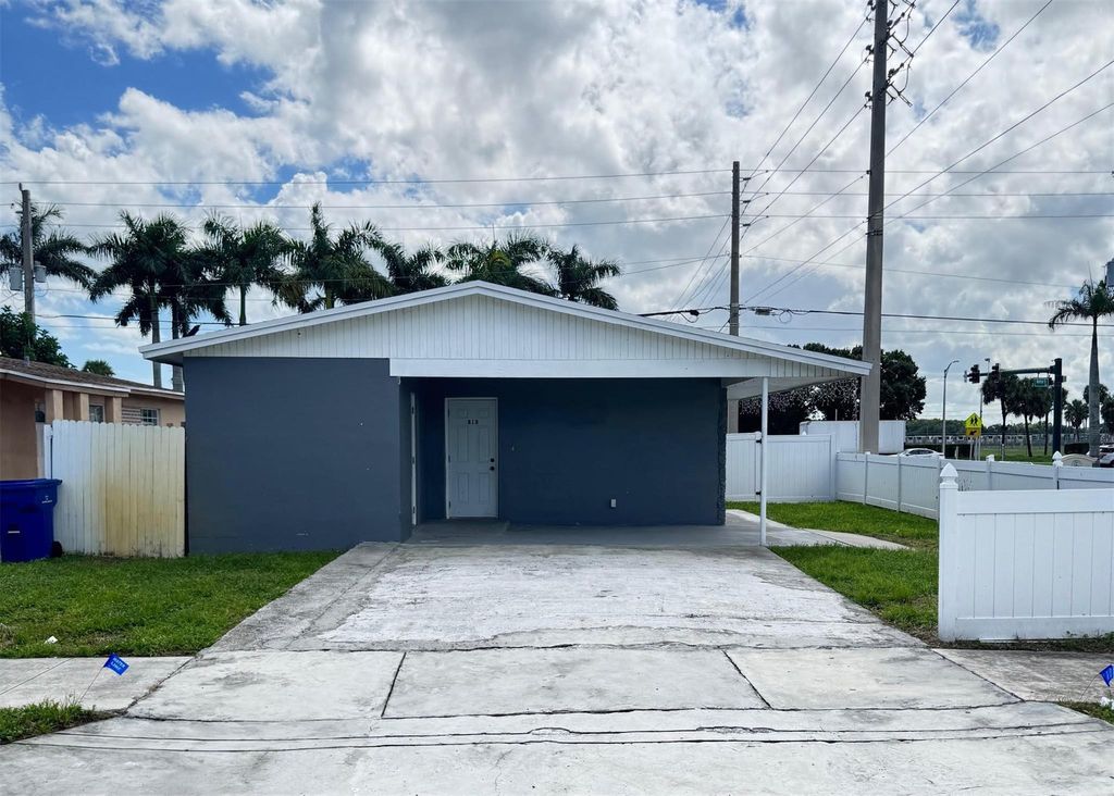 Photo of 818 Avenue U, Riviera Beach, FL 33404 (MLS # F10532598)