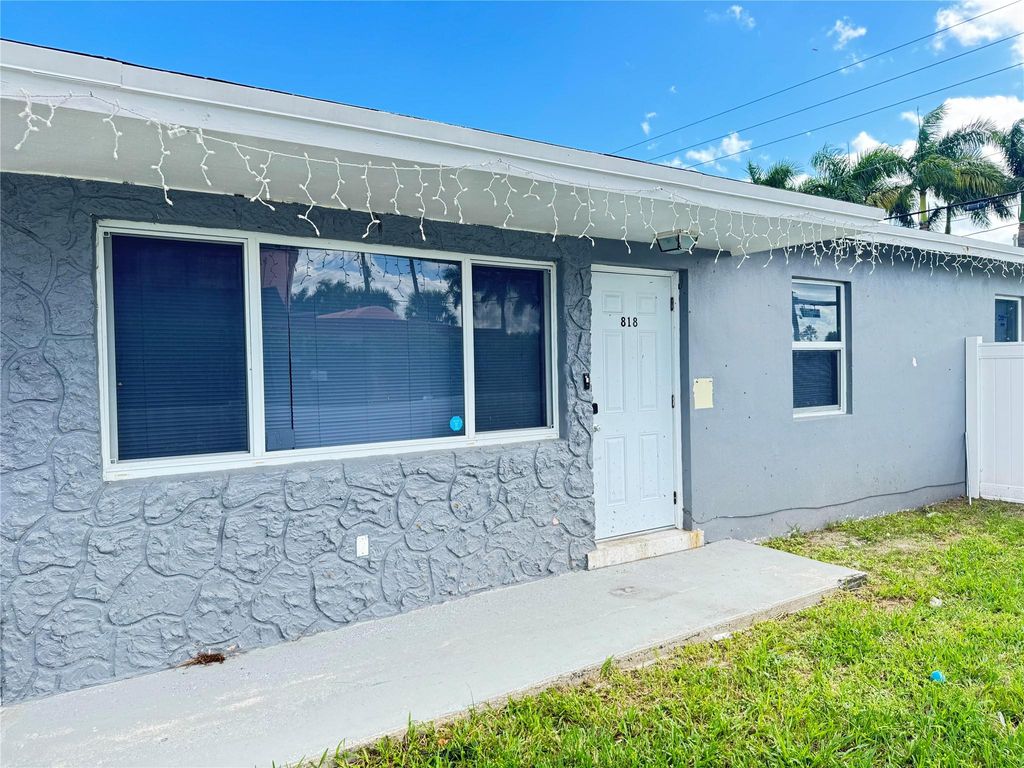 Photo of 818 Avenue U, Riviera Beach, FL 33404 (MLS # F10532598)