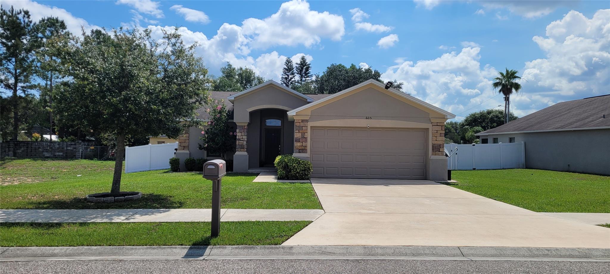 Southern Homes Builder, home built in 2018. Offers a turnkey split bedroom floor plan with modern elegance. A large master bedroom with a walk-in closet. Luxury vinyl flooring throughout the home creates a stylish, cohesive look. The living room features tall tray ceilings, adding to the homes open and airy feel. The kitchen has all stainless steel appliances, including a newer stove and dishwasher that provides both aesthetic and functionality appeal. Both bathrooms have been recently updated, adding to the homes refreshed, move-in-ready appeal. Convenience of an indoor washer/dryer hookup and a two car garage, completed by a a driveway that comfortablly accommodates four vehicles. The NEW vinyl fence enhances privary and security, enclosing a large backyard with space for a pool.