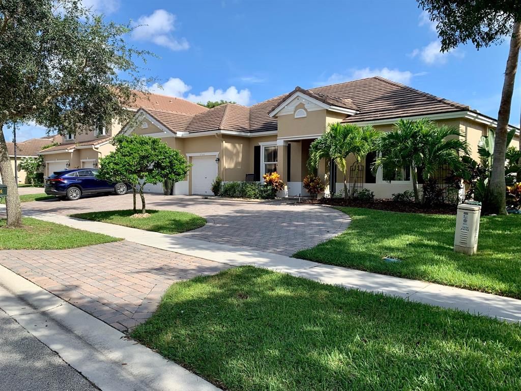 Photo of 9744 Savannah Estates Drive Dr, Lake Worth Beach, FL 33467 (MLS # R10739313)