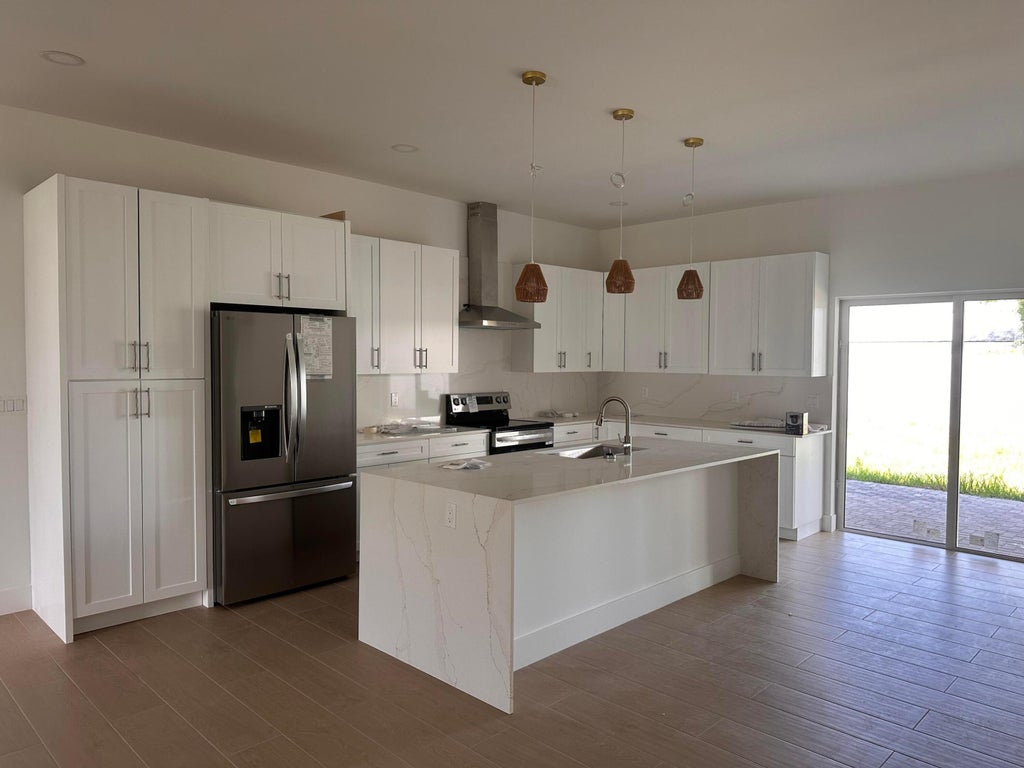 Photo of 106 Northview Drive, Jupiter, FL 33458 (MLS # R11101492)