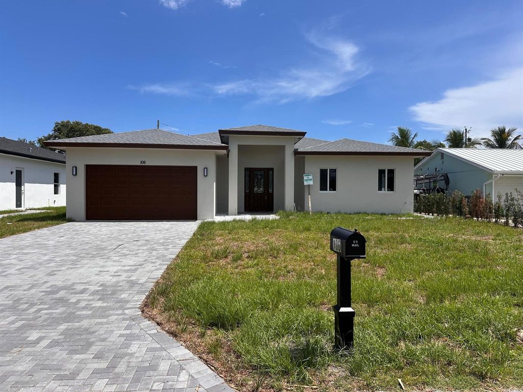 Photo of 106 Northview Drive, Jupiter, FL 33458 (MLS # R11101492)