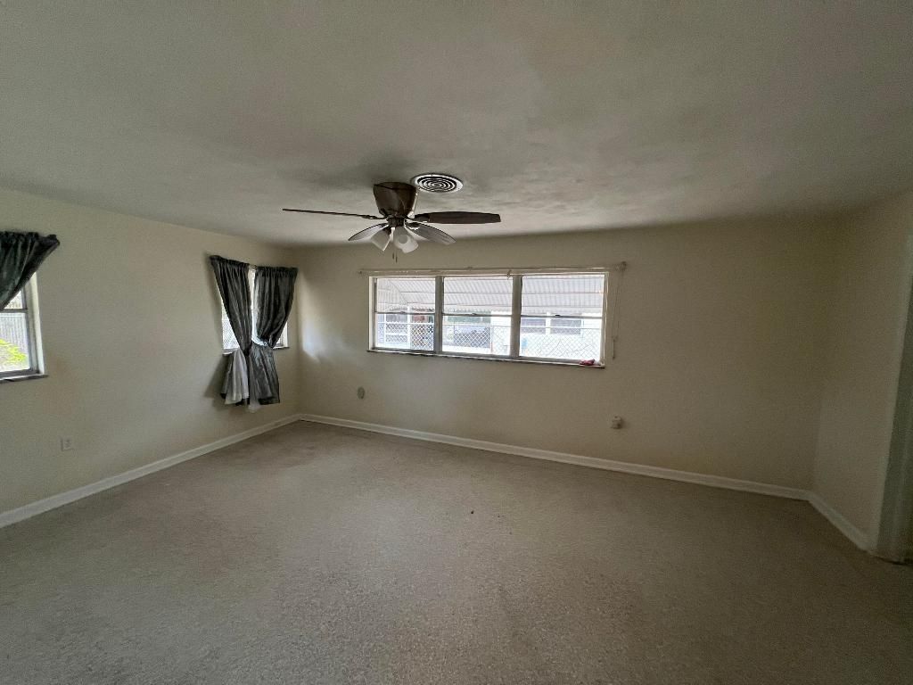 Photo of 1908 Colonial Road, Fort Pierce, FL 34950 (MLS # R10943469)