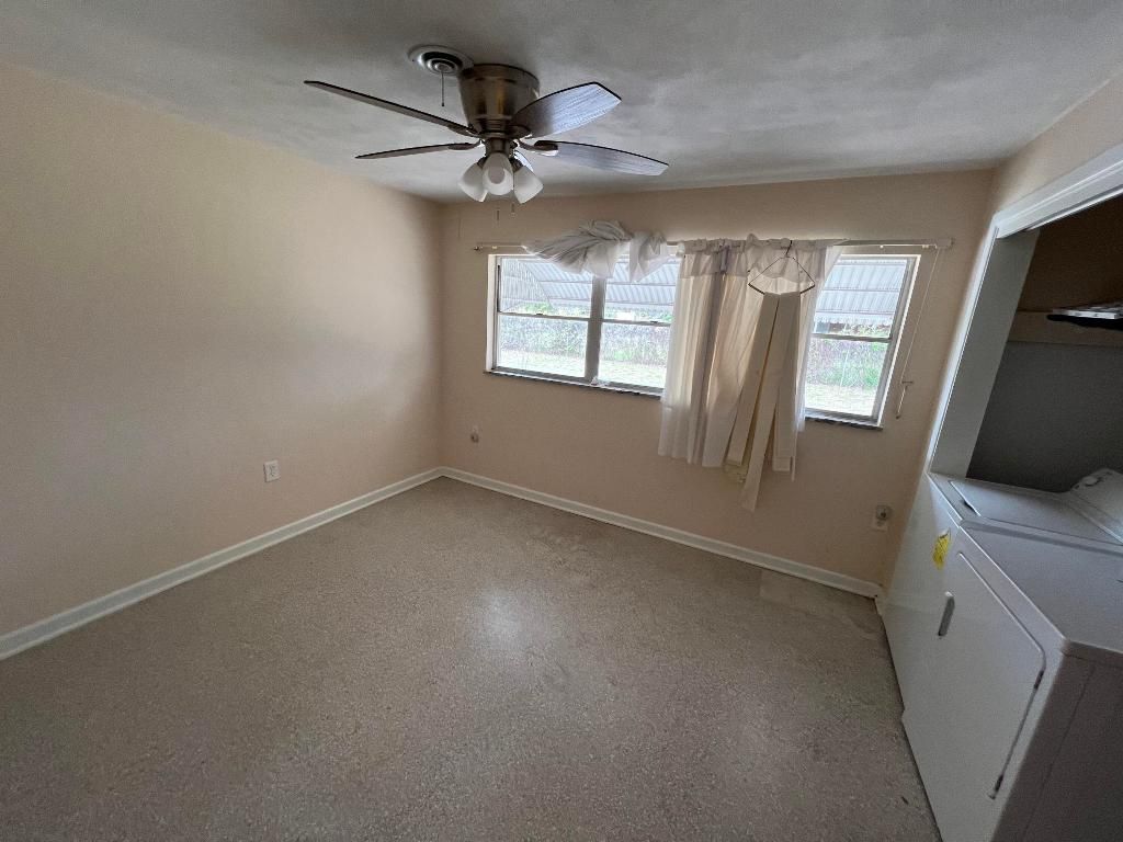 Photo of 1908 Colonial Road, Fort Pierce, FL 34950 (MLS # R10943469)