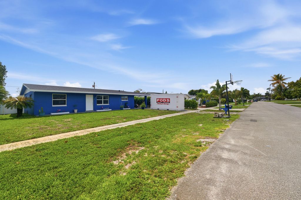 Photo of 5792 Tarragon Drive, West Palm Beach, FL 33415 (MLS # B26012431)