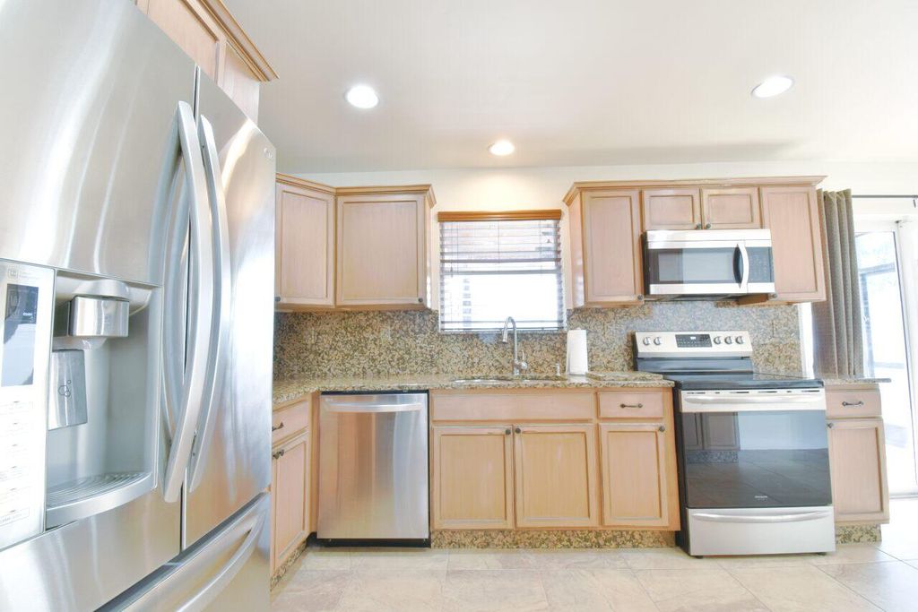 Photo of 9455 Birmingham Drive, Palm Beach Gardens, FL 33410 (MLS # R11117792)