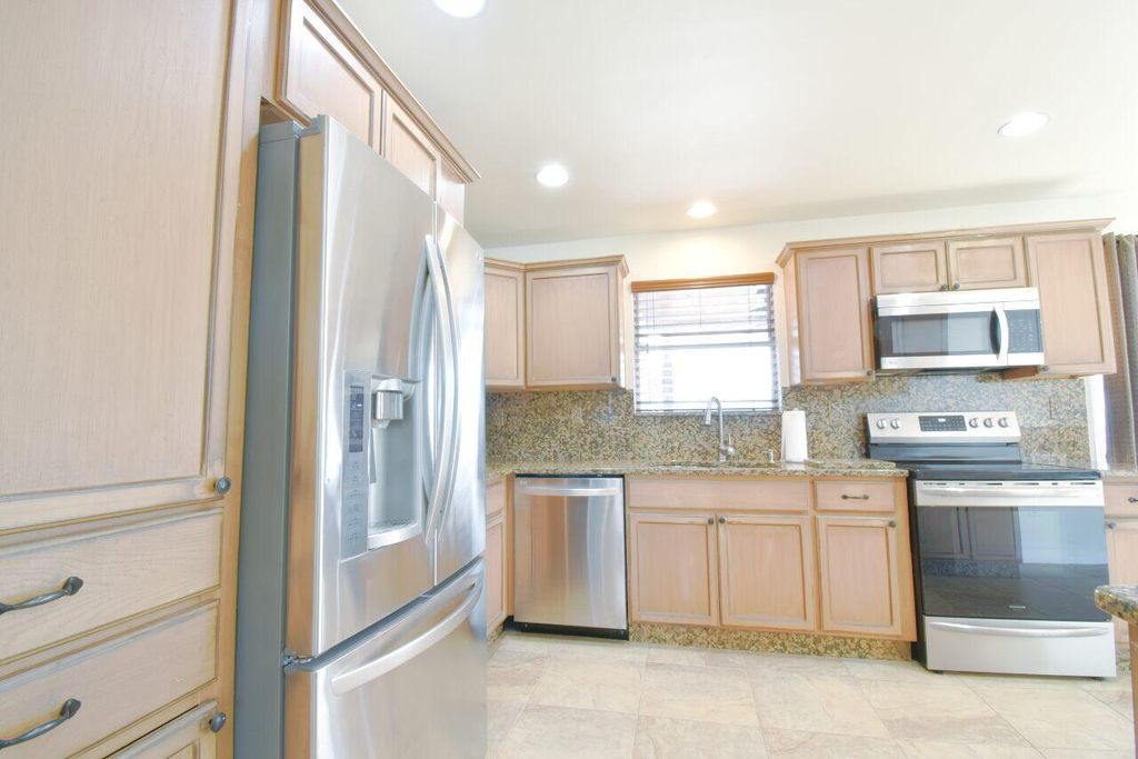 Photo of 9455 Birmingham Drive, Palm Beach Gardens, FL 33410 (MLS # R11117792)