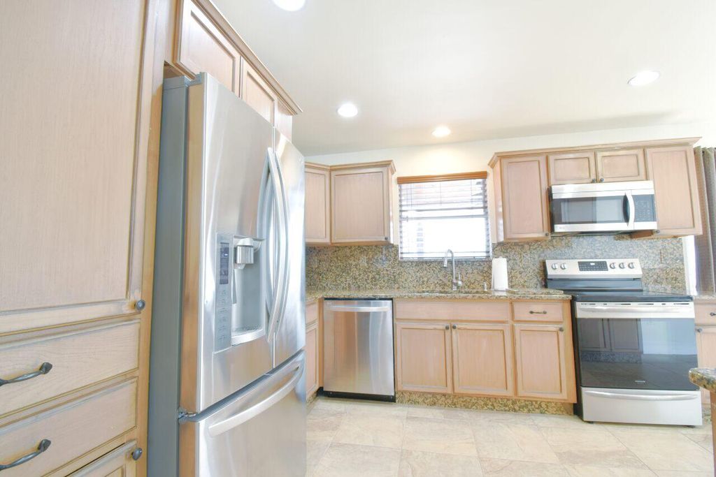 Photo of 9455 Birmingham Drive, Palm Beach Gardens, FL 33410 (MLS # R11117792)