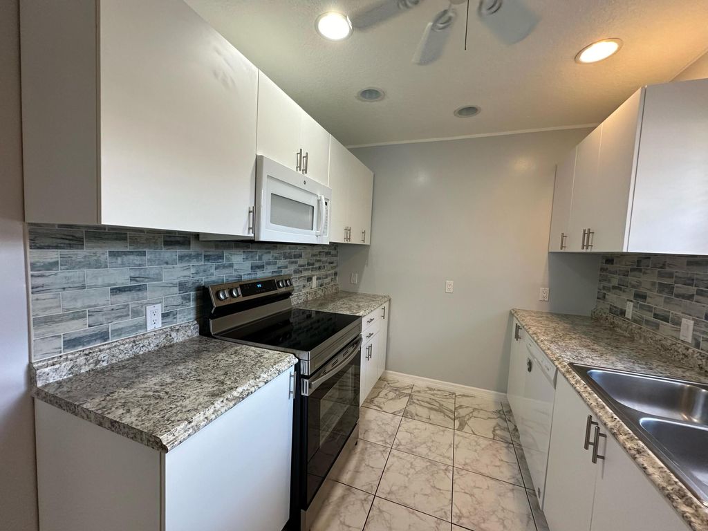 Photo of 14045 Wellington Trace, Wellington, FL 33414 (MLS # R10986202)