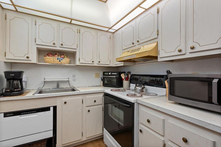 Bright & Airy 2/2 condo located at Sabal Palm Village in Tamarac, 55+ Community. This cozy unit is located on the 2nd floor, features carpet & laminate flooring. Large white kitchen with small pass through to living room area. NEW A/C & NEW Electric panel, Large master bedroom with walk-in closet and stand-up shower. Guest bedroom has mirrored closet. Spacious screened patio with wroll-ups - Can be used as a Den/Office. Laundry room on premises located on same floor, unit comes with extra storage room. The association offers a clubhouse with library, fitness room, heated pool, BBQ area & tennis courts. Secured Lobby. Priced to sell! No minimum income required! Mins to Turnpike, Shopping Plazas & Restaurants.