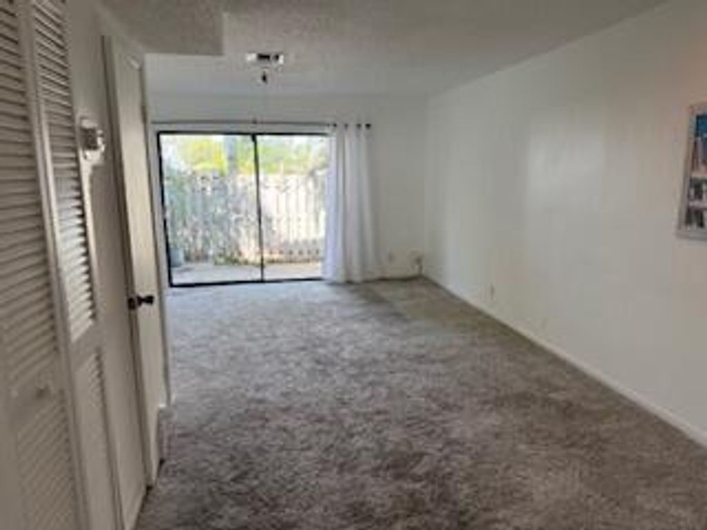 Photo of 423 N Cypress Drive #9, Tequesta, FL 33469 (MLS # R11088721)