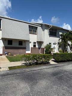 Photo of 423 N Cypress Drive #9, Tequesta, FL 33469 (MLS # R11088721)