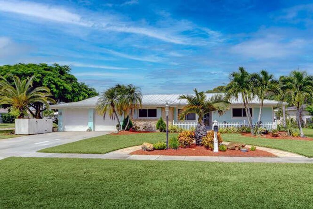 Photo of 3092 SE Treasure Island Road, Port Saint Lucie, FL 34952 (MLS # R10751223)