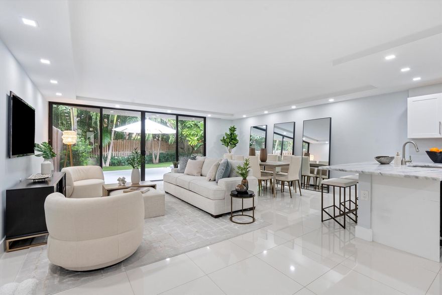 Currently Under Contract for Lease. LOCATION LOCATION LOCATION! Ideally located across the street from the beach and 8 blocks to Atlantic Avenue, this totally renovated 3 bedroom, 2.5 bathroom townhouse has it all: complete impact glass, 24'' x 24'' white porcelain flooring, LED lighting throughout, a huge backyard with lush landscaping and turf with plenty of room for seating as well as electricity and water to build out an outdoor kitchen. The white and bright kitchen features soft close cabinetry, stainless steel appliances, modern stone countertops and there is a nook with access to the front patio (a perfect place for your morning coffee or to set up a workstation). Upstairs is the Primary Bedroom and two additional guest bedrooms. The Primary Bedroom has a double door entry and features soaring ceiling heights, blackout shades and a large covered terrace overlooking the private backyard area. The Primary Bathroom has dual sinks with ample counter space, a large walk in closet and a beautifully tiled shower with 2 shower heads, a frameless glass enclosure, and a skylight. The other 2 bedrooms share a beautifully updated bathroom as well and they each have walk in closets, blackout shades, and high ceilings. Note: There are no popcorn ceilings or knockdown ceilings (except in the 2 ancillary guest bedrooms) and no carpet anywhere! The AC was replaced in 2023 and the Water Heater in 2014.

This 8 unit complex provides flexible leasing options (3x per year, minimum of 30 days each), allows pets up to 40lbs, has a community pool, and conveys to the owner of Unit 8, two parking spaces located in front of the unit.

The new Sirene townhouses across the street are selling north of $5M. The 1177 Condos next door are trading north of $2.5M.* This is an opportunity to move in now, benefit from your surroundings, and enjoy all that life has given you.

Atlantic Avenue is home to numerous shopping boutiques, dozens of spectacular dining options, an iPic movie theatre, live music, cultural activities, a tennis center and more.

Condo Association is complying with condo laws regarding milestones and structural integrity studies. When the assessment is issued, the Seller will PAY IN FULL PRIOR TO CLOSING.

* Pricing at adjacent properties are subject to change and Buyer to do own due diligence of area to determine appropriate value.

Also listed for rent @ $8,500/month (annual, unfurnished lease) RX-11033999 - CURRENTLY UNDER CONTRACT FOR LEASE.