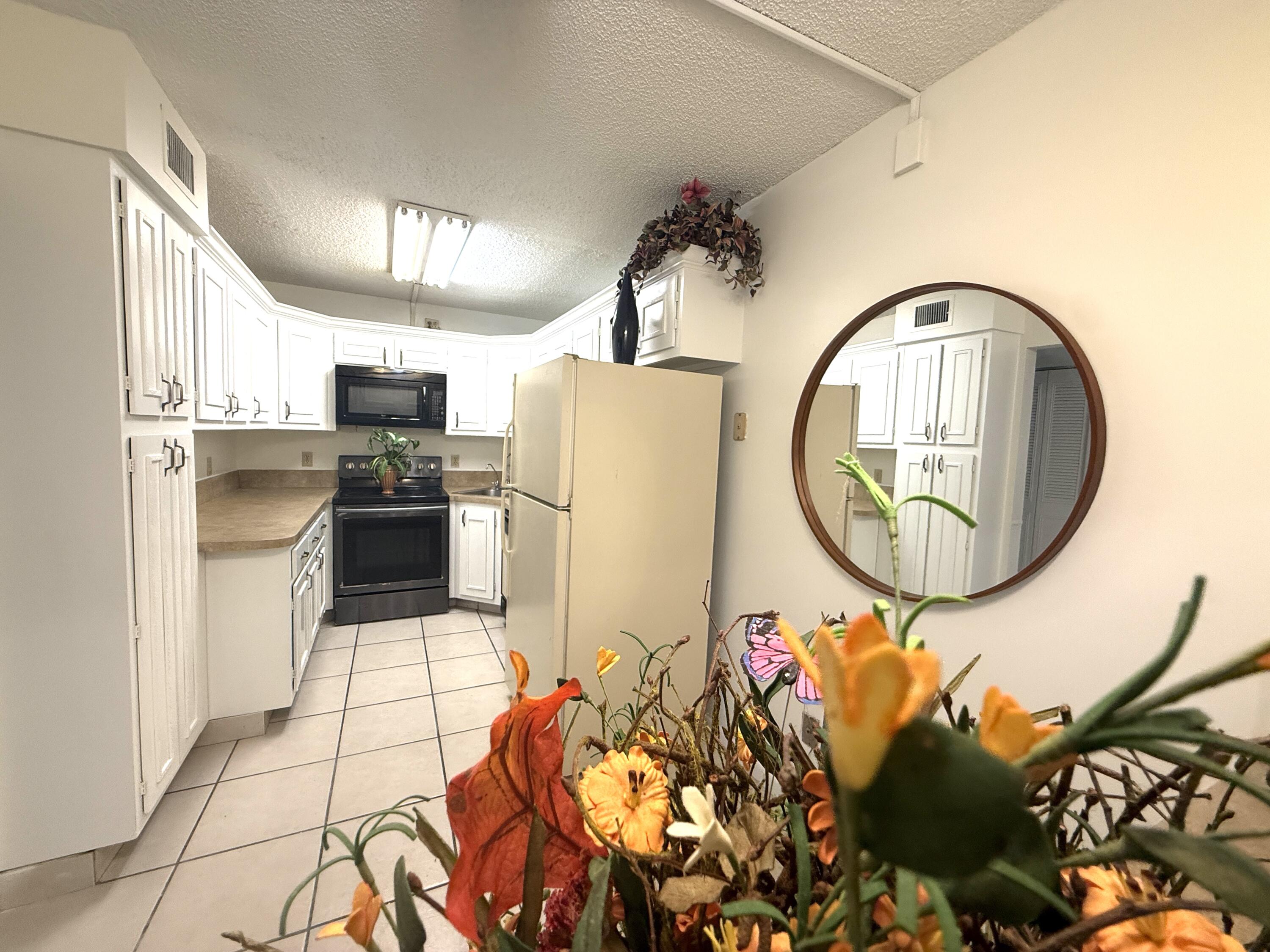 LOCATION !! LOCATION !! LOCATION !! THIS BEAUTIFUL 3 BEDROOM 2 BATHROOM PLUS SCREENED BALCONY UNIT AT DESIRABLE ''PALM CLUB VILLAGE'' LOCATED JUST MINUTES AWAY FROM SHOPPING, SCHOOLS, ENTERTAINMENT, BEACHES, HIGHWAYS !!!! ONE OF THE MOST FAVORED UNITS- WITH GORGEOUS WATER VIEWS FROM MASTER SUITE, LIVING ROOM, PATIO , AND OTHER 2 BEDROOMS- JUST THE PERFECT HOME FOR ANY FAMILY ***. NEW PAINT INSIDE, ACORDIAN SHUTTERS **. MASTER SUITE WITH LARGE WALK IN CLOSET, LARGE WINDOWS WITH BEAUTIFUL RELAXING WATER VIEWS **. 1ST FLOOR & CORNER / END UNIT **. RESORT SYLE AMENITIES- AND SURE TO PLEASE ANYONE- HEATED POOL, TENNIS, WALKING AND CYCLE TRAILS - SCHEDULE YOU APPT TO SEE THIS BEAUTIFUL CONDO AT 1010 GREEN PINE BLVD #G1 , WEST PALM BEACH FLORIDA