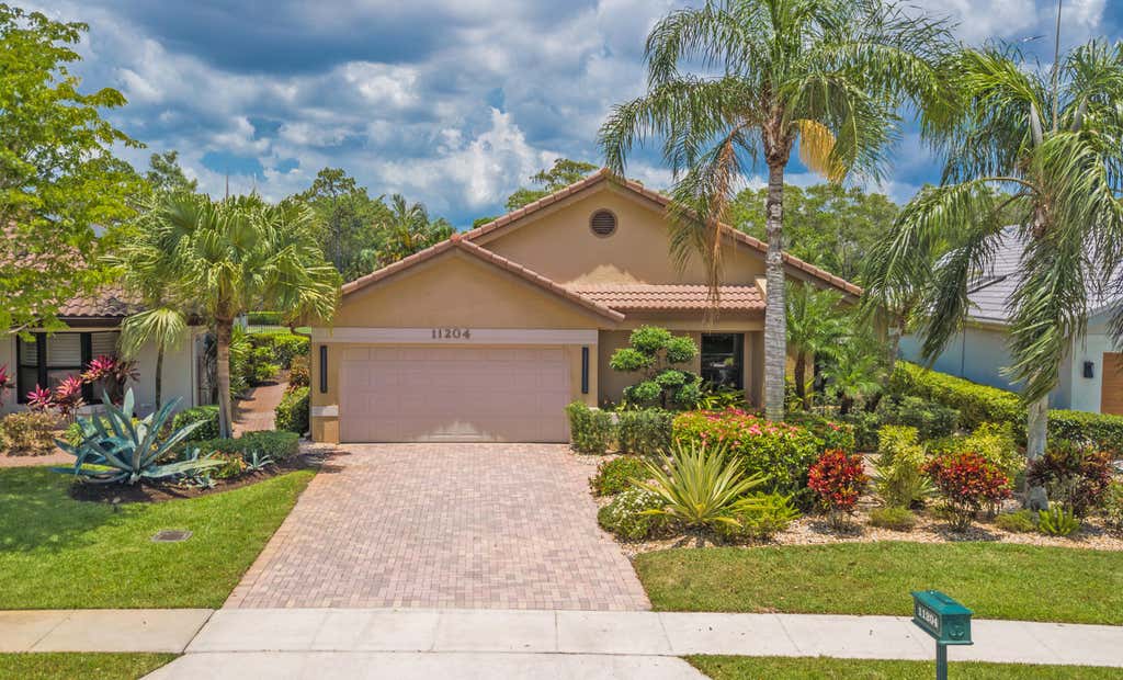 Photo of 11204 Cloverleaf Circle, Boca Raton, FL 33428 (MLS # B26062825)