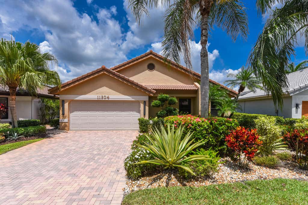 Photo of 11204 Cloverleaf Circle, Boca Raton, FL 33428 (MLS # B26062825)