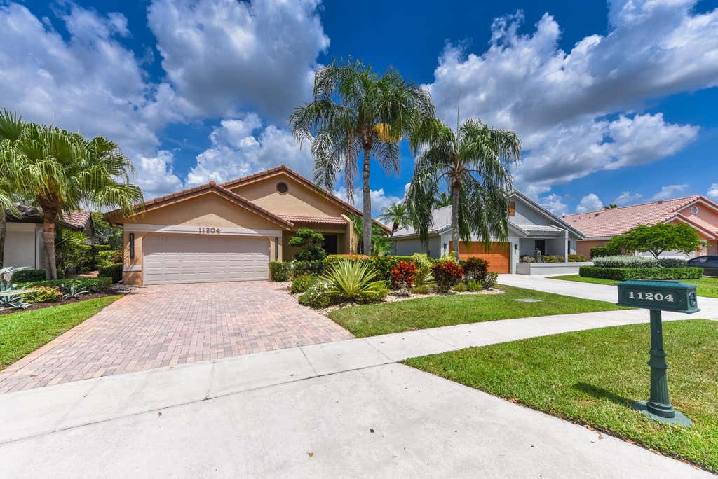 Photo of 11204 Cloverleaf Circle, Boca Raton, FL 33428 (MLS # B26062825)