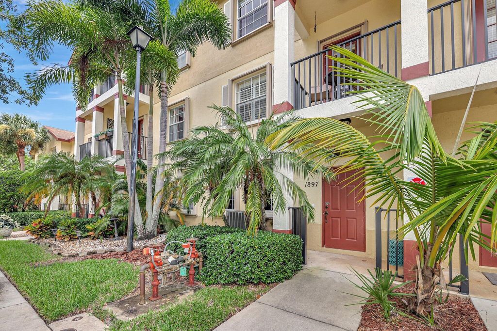 Photo of 1897 SE High Springs Drive, Port Saint Lucie, FL 34952 (MLS # R11012164)