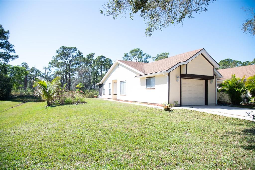 Photo of 1408 SE Rivergreen Circle, Port Saint Lucie, FL 34952 (MLS # R10694022)