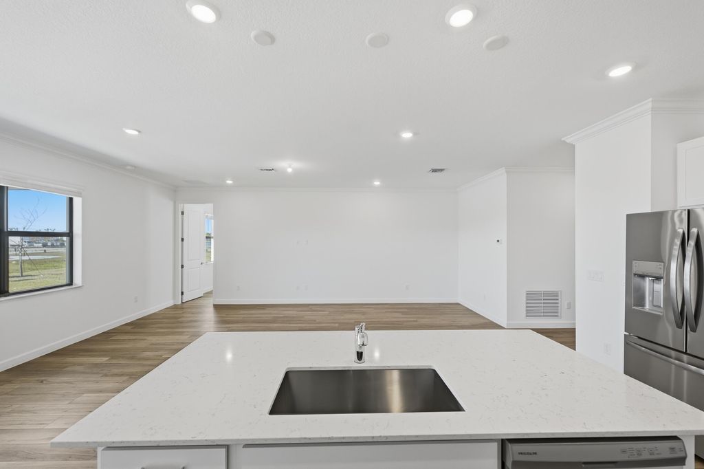 Photo of 6907 NW Kestrel Ln, Port Saint Lucie, FL 34987 (MLS # B26030868)