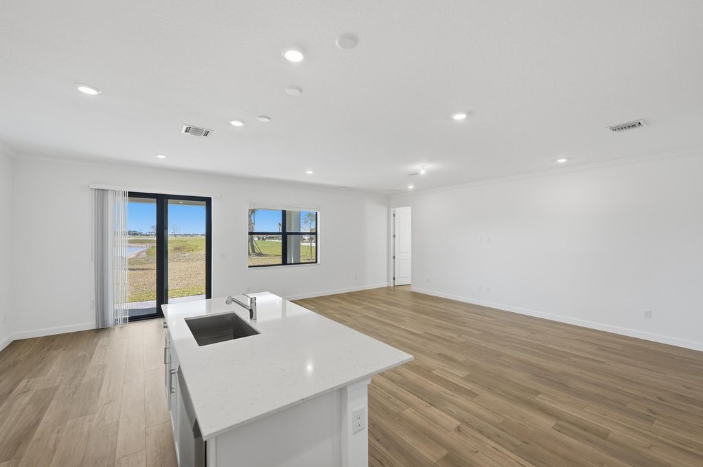 Photo of 6907 NW Kestrel Ln, Port Saint Lucie, FL 34987 (MLS # B26030868)