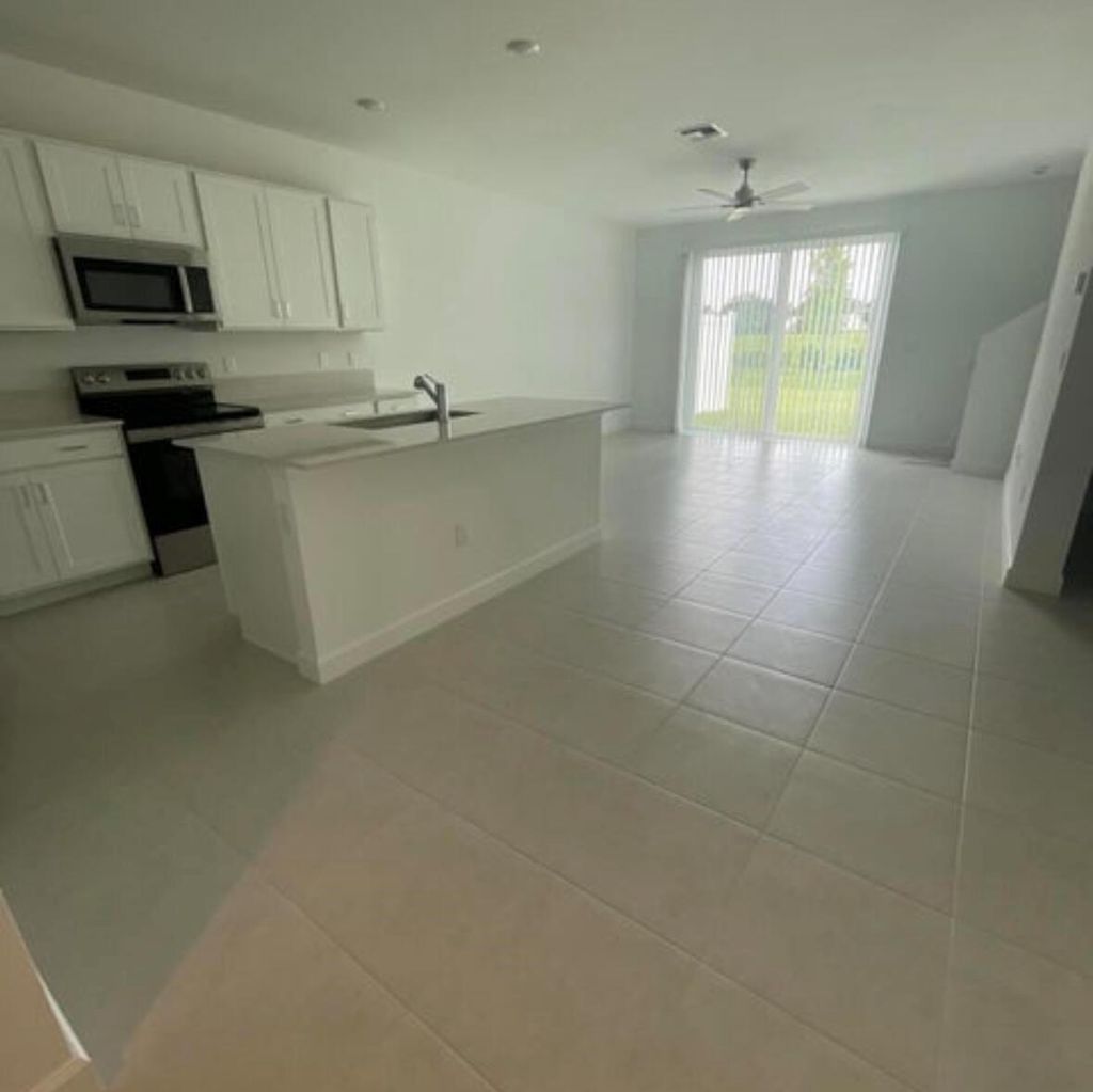 Photo of 700 SE Lake Falls Street, Port Saint Lucie, FL 34984 (MLS # R11006125)