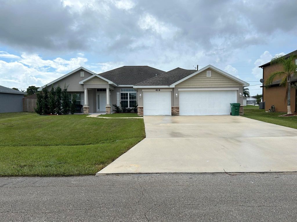 Photo of 414 SW Ewing Avenue, Port St Lucie, FL 34983 (MLS # R10922851)