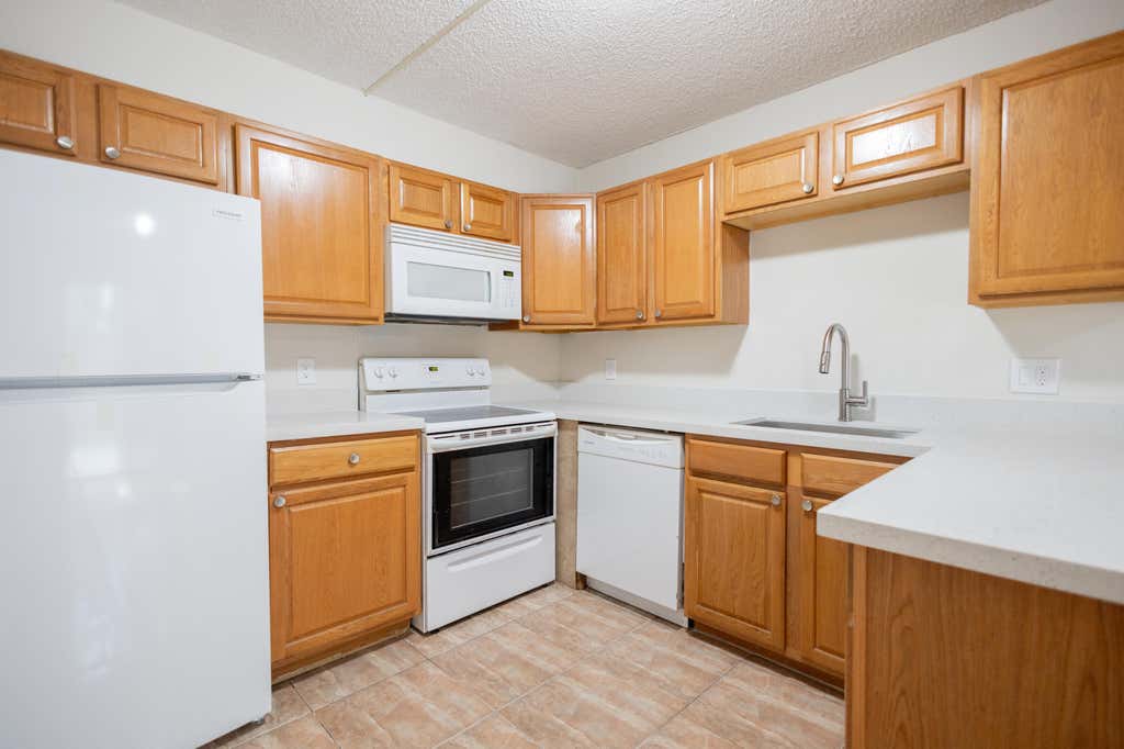 Photo of 317 Woodland Road, Palm Springs, FL 33461 (MLS # B26036599)