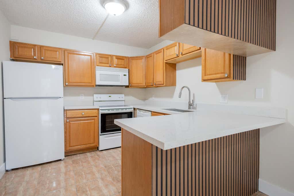 Photo of 317 Woodland Road, Palm Springs, FL 33461 (MLS # B26036599)