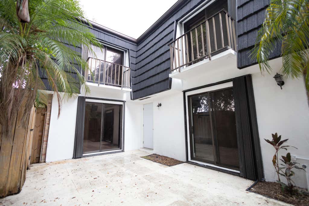 Photo of 317 Woodland Road, Palm Springs, FL 33461 (MLS # B26036599)
