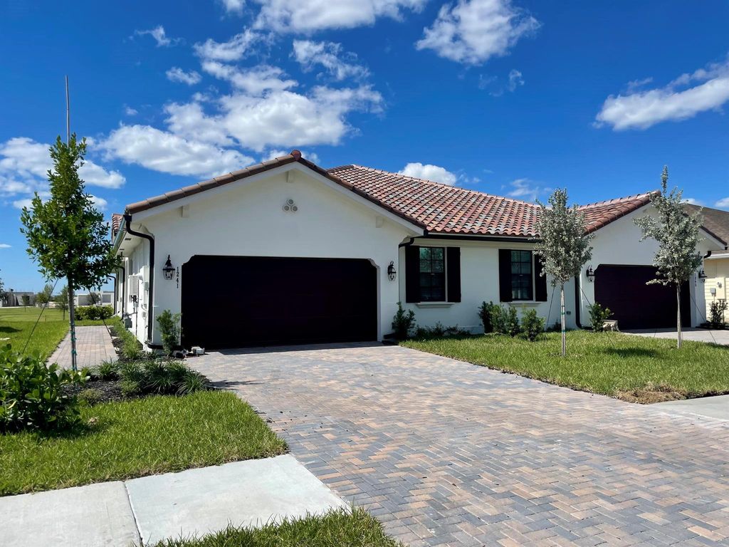 Photo of 1241 Haywagon Trail, Loxahatchee, FL 33470 (MLS # R11083544)