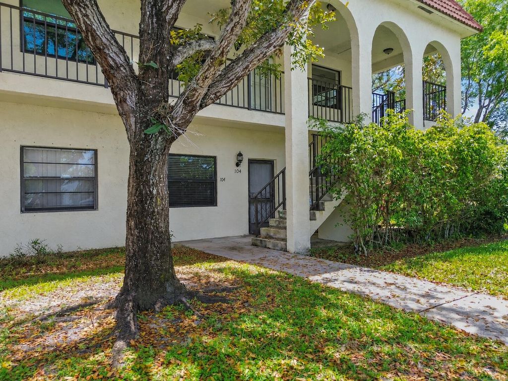 Photo of 3408 Cypress Trail #104, West Palm Beach, FL 33417 (MLS # B26025848)
