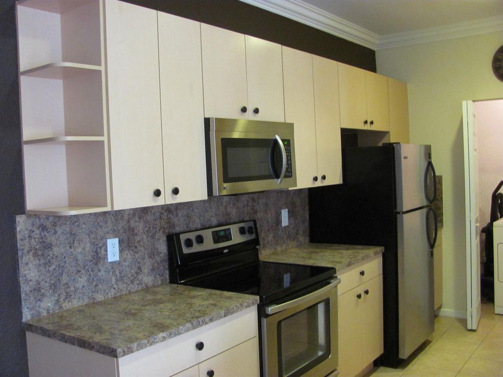 Photo of 3569 Forest Hill Boulevard #102, Palm Springs, FL 33406 (MLS # R11090040)