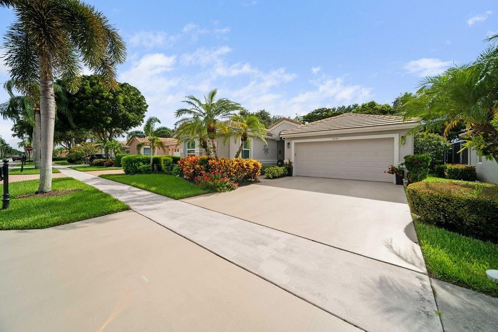 Photo of 9846 Harbour Lake Circle, Boynton Beach, FL 33437 (MLS # B26060422)