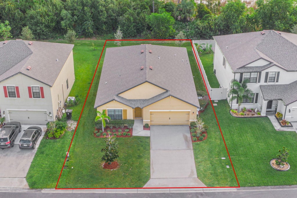 Photo of 6110 NW Regent Street, Port Saint Lucie, FL 34983 (MLS # R10935709)
