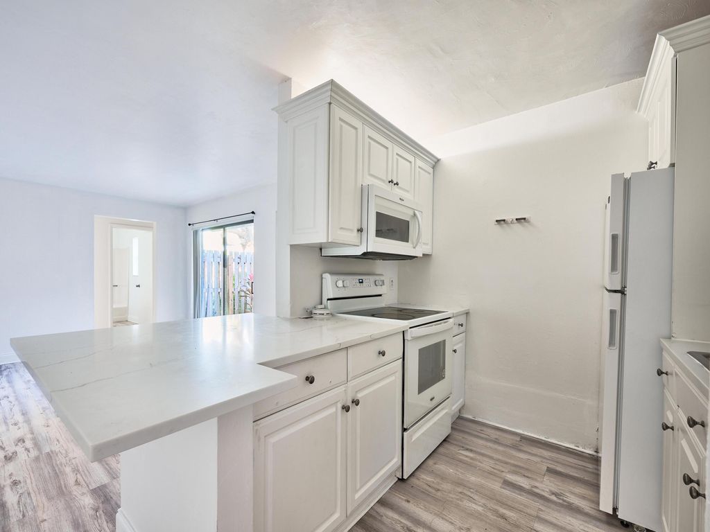 Photo of 21 Crossings B Circle #B, Boynton Beach, FL 33435 (MLS # R11039330)