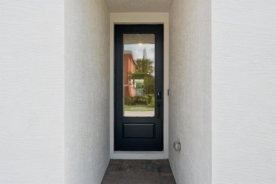 The Finlay II plan is a beautiful plan with 4BR, 2 BA, 2 Car garage. This well-designed home showcases a spacious peninsula-style kitchen with Admiral Blue 42'' upper cabinets, Iced White Quartz countertops, and GE stainless steel appliances. The open floorplan extends into a bright, airy great room with expansive windows, while the dining area connects seamlessly to the covered patio. Backing to tranquil wooded preserves, the homesite offers exceptional privacy--perfect for relaxed living and indoor-outdoor entertaining.The elegant primary suite features a spa-inspired bath with dual vanities and a generous walk-in closet. Three additional bedrooms offer ample space for family, guests, or a home office. Added conveniences include irrigation with St. Augustine grass, a washer and