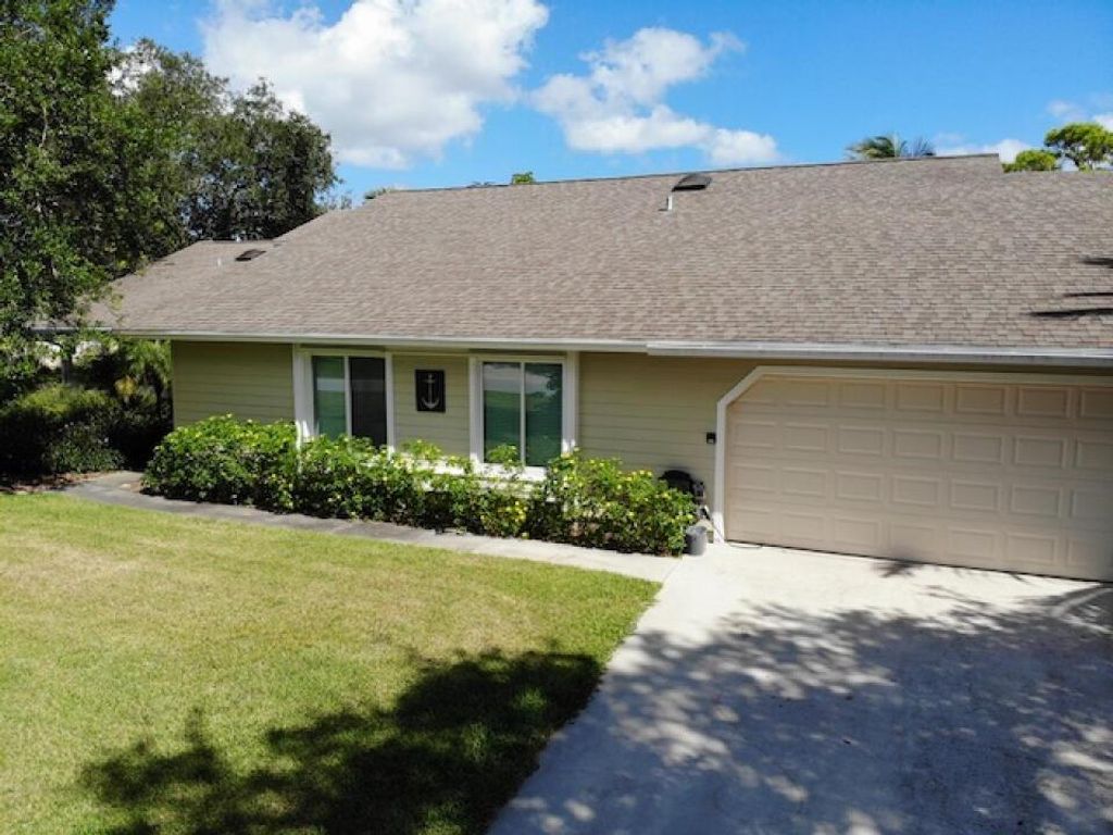 Photo of 3015 NE Loquat Lane, Jensen Beach, FL 34957 (MLS # R10757530)
