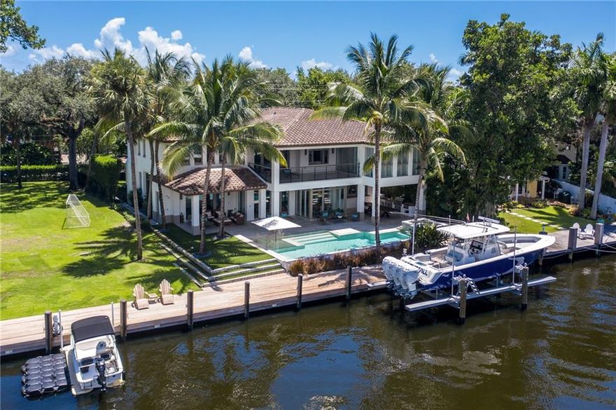 The ultimate South Florida lifestyle awaits at this modern masterpiece on the water, which features a stunning design by Bob Tuthill and interior design by William Peacock. At 6,000 square feet, this home features a beautiful open concept with seven bedrooms, six bathrooms and two half-baths. Located on the tranquil, tree-lined Ponce de Leon Drive in Rio Vista, it is uniquely angled to give remarkable views of the New River. Outside, a Delano-style pool and landscaping by architect George Keen make this one of the most beautiful estates in East Fort Lauderdale.