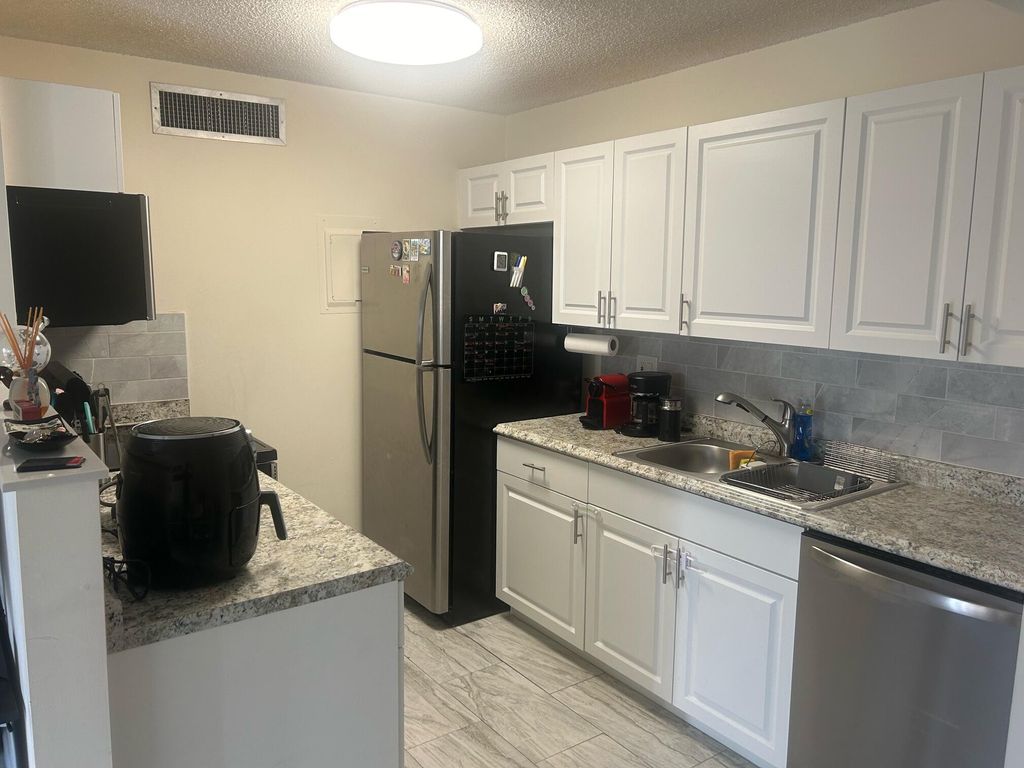 Photo of 639 Executive Center Drive #O-205, West Palm Beach, FL 33401 (MLS # R10988956)