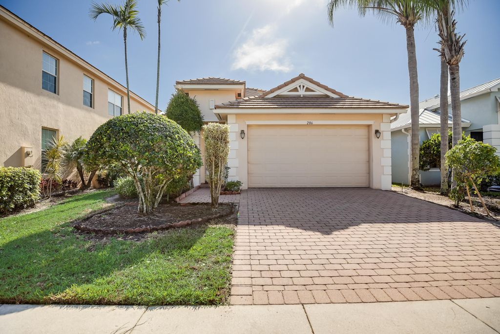 Photo of 286 Mulberry Grove Road, Royal Palm Beach, FL 33411 (MLS # R11047546)