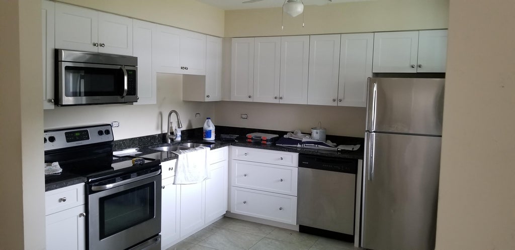 Photo of 2701 OLD DONALD ROSS Road, Palm Beach Gardens, FL 33410 (MLS # B26068821)