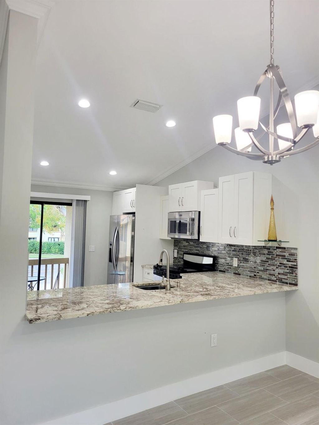 Photo of 12970 Dartford Trail #7, Wellington, FL 33414 (MLS # R11085310)