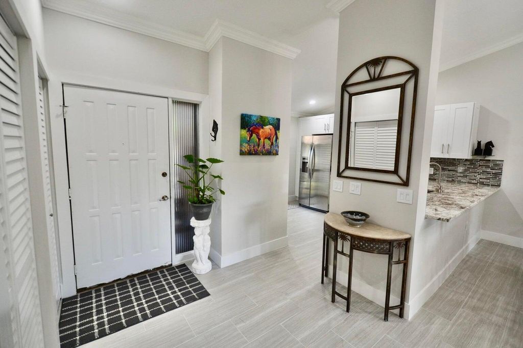 Photo of 12970 Dartford Trail #7, Wellington, FL 33414 (MLS # R11085310)