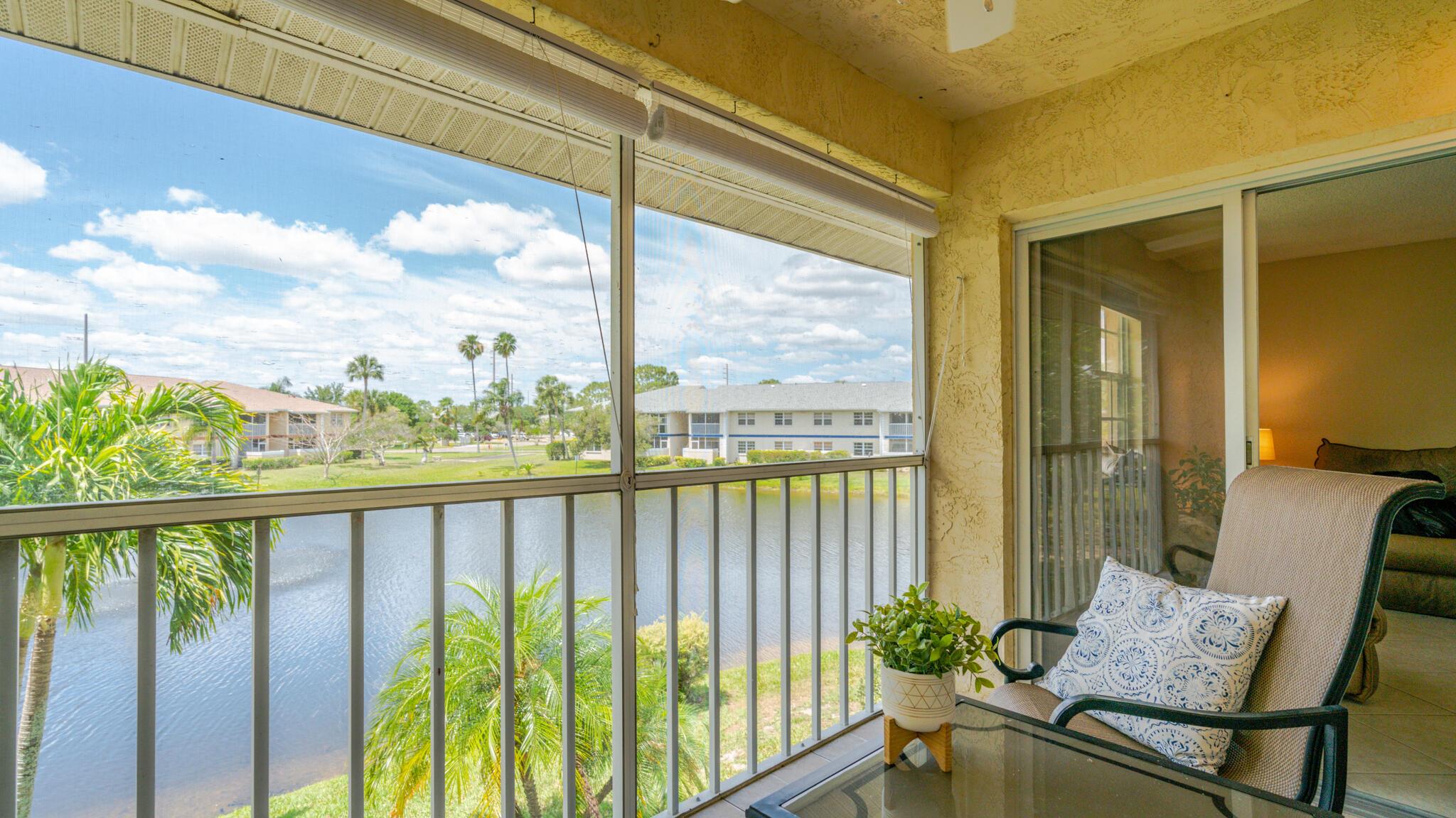 LAKE VIEWS FROM EVERY ROOM!Prepare to fall in love with this LIGHT-filled, PRIVATE LOCATION in highly sought-after Midport Place II. This RARE opportunity is truly one of a kind with the tranquil lake views and private corner entrance. Updates include 2022 Roof, Water Heater, stainless appliances, vanities, fixtures, and laminate flooring. The two sliding glass doors and large window offer lake views from both bedrooms and all living areas. Enjoy the screened balcony and front screened door for seamless indoor-outdoor living. The heated pool and clubhouse are located a short walk away! Midport community is conveniently located near shopping, dining, medical centers and just minutes to the beach! A Must See!