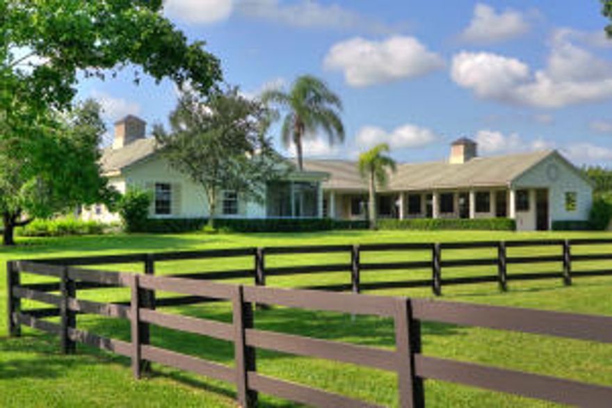 This Palm Beach Point property includes adjoining parcel for a total of 12.31 acres! Freshly painted with 6-stalls, tack & feed rooms and plenty of storage. The 4-bedroom, 2-bath house is absolutely stunning and has never been lived in! Beautiful hardwood floors throughout and stainless steel appliances in the kitchen.